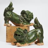 A Pair of Green-Glazed Figures of Buddhistic Lions, 20th Century, 二十世纪 绿釉福狮一对, length 23 in — 58.4 c