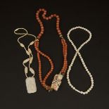 Three Ivory and Carnelian Beaded Necklaces, 牙雕及玛瑙珠串一组三件, longest length 15.9 in — 40.5 cm (3 Pieces)