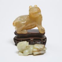 An Agate Carving of a Tiger, Together With a White and Russet Jade Carving of a Mythical Beast, Repu