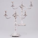 Pair of Georgian and Later Silver Two-Light Candelabra, the bases possibly Louis Herne, London, 18th