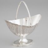 George III Silver Bright-Cut Shaped Oval Sugar Basket, Henry Chawner, London, 1786, height 6.9 in —
