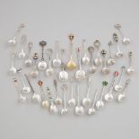 Thirty-Four English, Continental and North American Silver Souvenir Spoons, 20th century, largest le