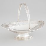 English Silver Pierced Oval Cake Basket, Mappin & Webb, Sheffield, 1924, height 9.1 in — 23 cm; len