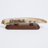 Scrimshawed Fossilised Walrus Ivory Tusk by Karen Lee Carmack, 20th century, height 13.2 in — 33.5 c