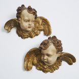 Pair of Italian Baroque Carved, Polychromed and Parcel Gilt Winged Cherubic Heads, 19th century, 9 x