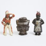 Two Painted Cast Iron Figural Still Banks and a Head Form Bank, 19th/early 20th centuries, height 6.