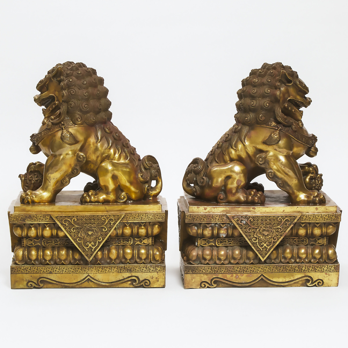 Pair of Buddhist Gilt Bronze Foo Dogs, early 20th century, 17.5 x 12 x 8.25 in — 44.5 x 30.5 x 21 cm - Image 2 of 2