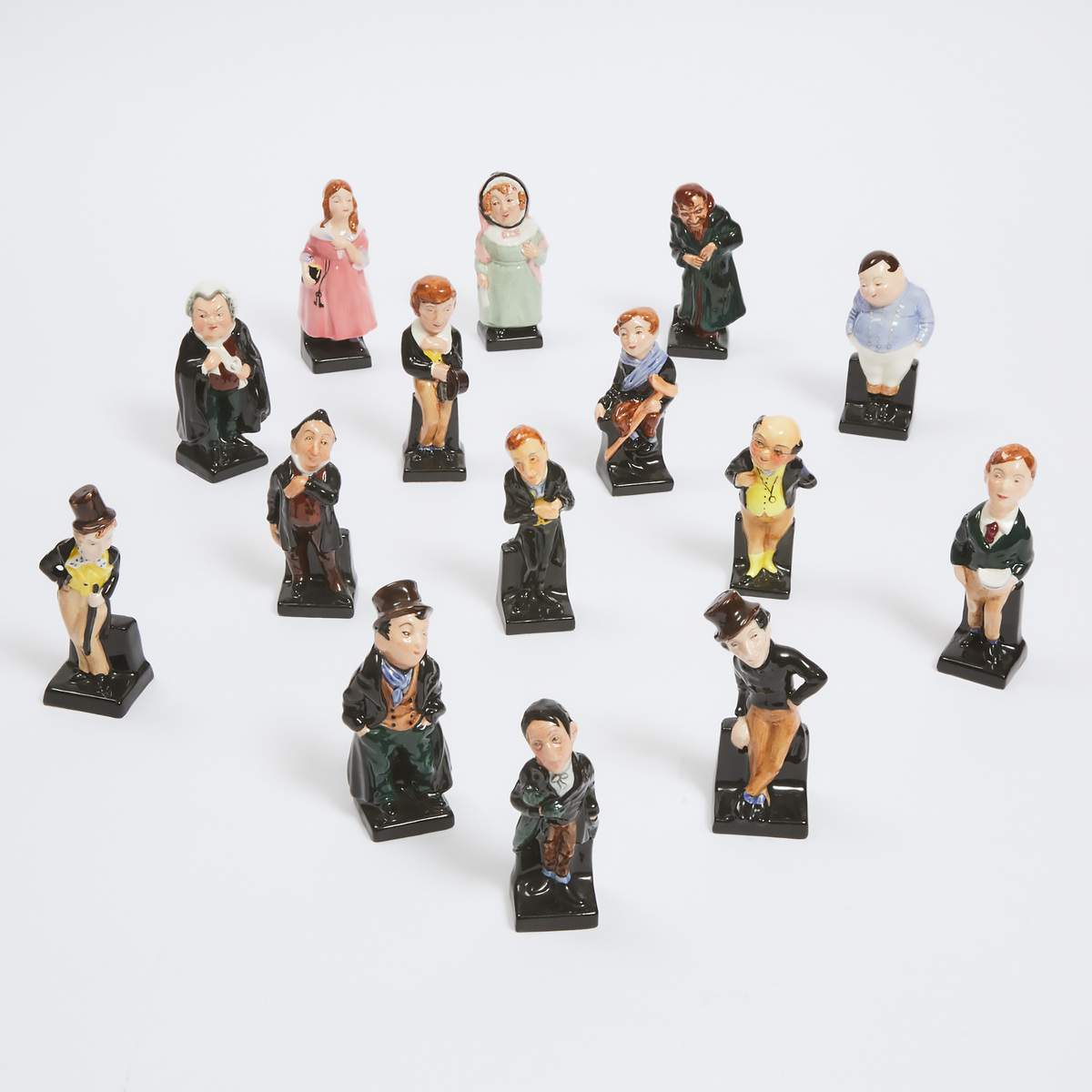 Fifteen Miniature Royal Doulton Charles Dickens Character Figurines, 20th century, largest height 4.