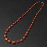 A Natural Coral Tubular Beaded Necklace, 天然珊瑚珠链一串, length 24.4 in — 62 cm