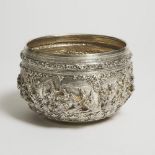 A Large Burmese Silver Bowl, Circa 1900, 约1900年 缅甸银浮雕大碗, diameter 9.1 in — 23 cm