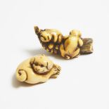 Two Ivory Netsuke of Puppies, Early to Mid 19th Century, longest length 2.8 in — 7 cm (2 Pieces)
