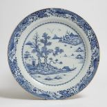 A Large Blue and White 'Landscape' Plate, 18th Century, 清 十八世纪 青花山水纹大盘, diameter 18.3 in — 46.4 cm