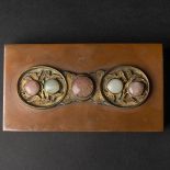 A White Jade and Tourmaline Inlaid Gilt Bronze Belt Buckle, Qing Dynasty, Later Mounted into a Box,