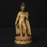 A Gilt Painted Ivory Figure of Shakyamuni, Qing Dynasty, 清 牙雕金彩释迦牟尼立像, height 2.2 in — 5.5 cm