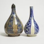 Two Safavid Blue and White Bottle Vases, Persia, 17th Century, tallest height 11.4 in — 29 cm (2 Pie