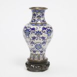 A Ming-Style Blue-Enameled 'Peony Scroll' Cloisonné Vase, 19th/20th Century, 晚清/民国 明式宝相花纹铜胎掐丝珐琅瓶, he