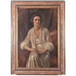 A 1920s oil painting on canvas. Portrait of a young woman. Unsigned in a gilt and painted frame.