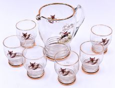 A glass Lemonade set. Comprising a jug and 6 glasses. With hunting scenes. VGC. £20-40