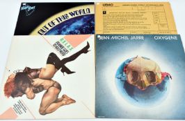 18x LP records. Including; UB40. The Moody Blues; Voices in the Sky, Out of This World, Long