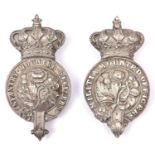 A Victorian white metal martingale badge for Infantry Mounted Officers; and a similar white metal