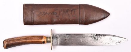 A mid Victorian Bowie knife, spear point blade 8" with false back edge, the ricasso marked "BAKER"