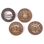 4 helmet plate centres: Devonshire, pre 1900 Suffolk, West Yorkshire, and East Yorkshire (the last