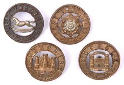 4 helmet plate centres: Devonshire, pre 1900 Suffolk, West Yorkshire, and East Yorkshire (the last