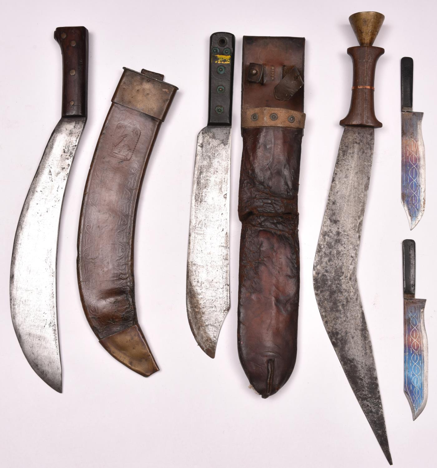 A military machete, the blade stamped "J.J.B", broad arrow, and "1945", in its leather sheath