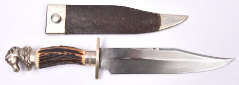 A Bowie knife, broad clipped back blade 9¾" stamped with Wostenholm eagle, Rodgers star and cross,