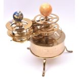 An Orrery / Tellurion brass model. Produced as a partwork by Eaglemoss this substantial 'precision
