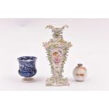 3x porcelain items. A possibly German vase with raised flower decoration. Together with a Wedgwood