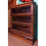A 3-section Globe Wernicke mahogany bookcase with drawer to base. Height 108cm x width 87cm. GC. £