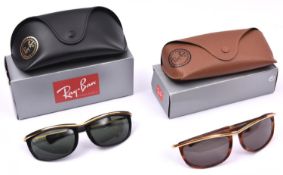 2x Ray-Ban Sunglasses. Both with straight arms and plated brow. Both in cases. GC, some wear. £40-60