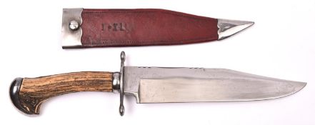 A late Victorian Bowie knife, by G Wostenholm, the heavy clipped back blade 9½" marked "G.