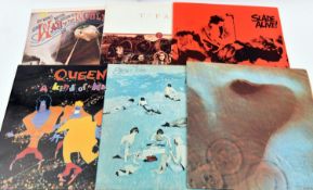 35+ 12" vinyl records of mainly 1970s/80s mainstream rock and pop including: Dire Straits; Walk of