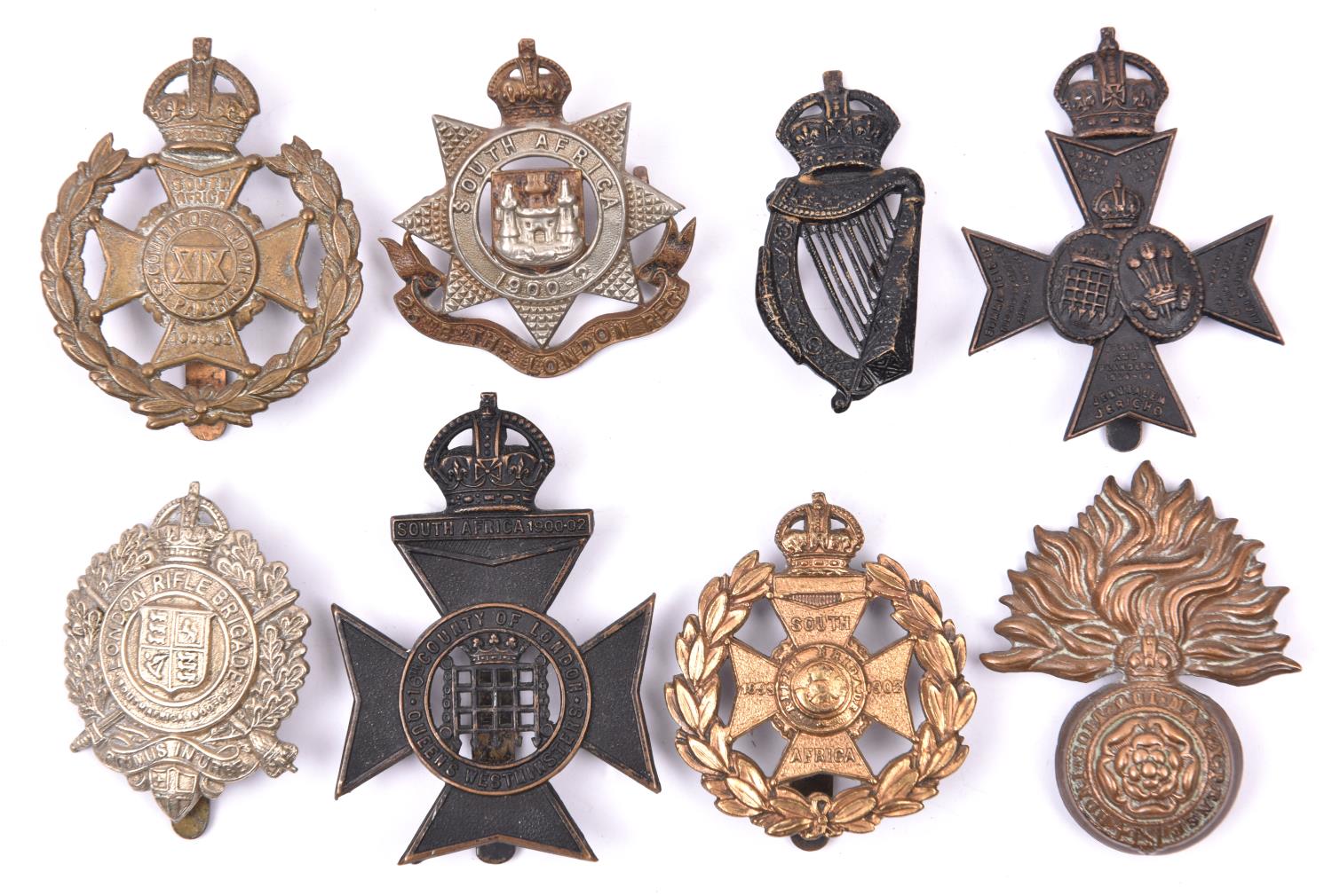 8 London Regiment cap badges: Royal Fusiliers (1st to 4th Bns), pre 1920 5th (London Rifle Brigade),