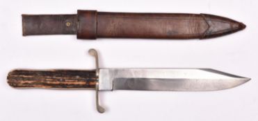 An early 20th century Bowie knife, heavy clipped back blade 9", the ricasso marked ?ED. WUSTHOT,