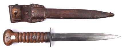A Dutch WWI pattern fighting knife, blade 8" with small crowned "Z" mark, with ribbed wooden hilt,