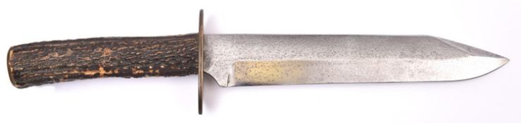 A Bowie knife, broad single edged blade 8¾" with short false edge, the ricasso stamped ?H.M. FINCH?,