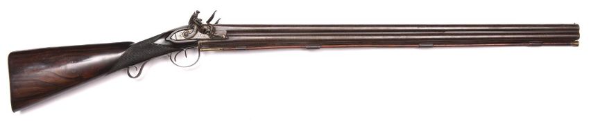An 18 bore double barrelled over and under flintlock sporting gun, by Tatham & Egg, c 1810, 48"