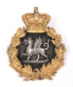 A Victorian South Wales Borderers officer's gilt and silver forage cap badge. GC £50-60
