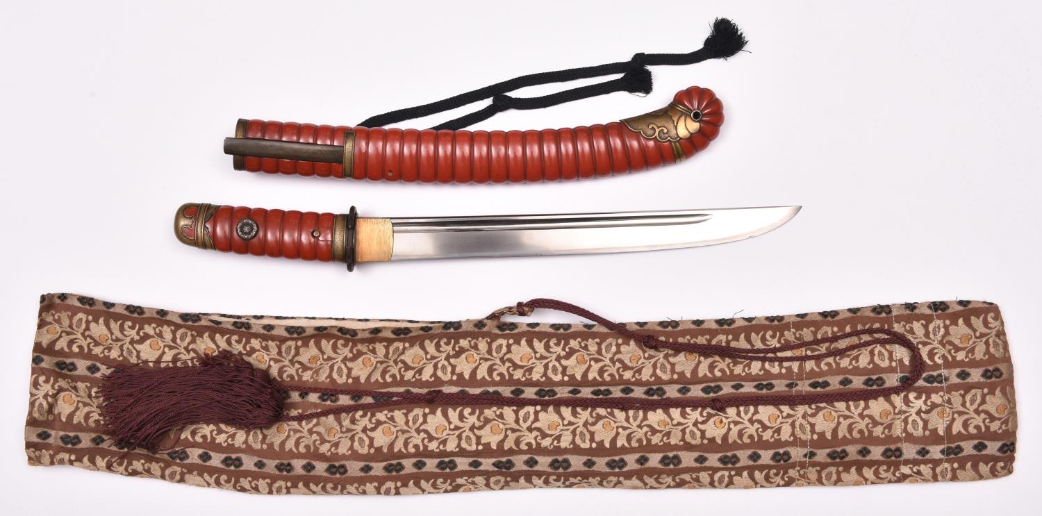 An O Tanto , with blade showing bonji and ken grooves, thin suguha hamon and tang with Kinisan