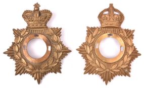 A Victorian OR's helmet plate back plate only, and a similar post 1902 back plate (loops missing) GC