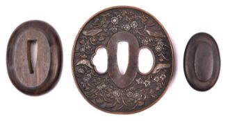 A 20th century Shakudo tsuba, GC £80-120