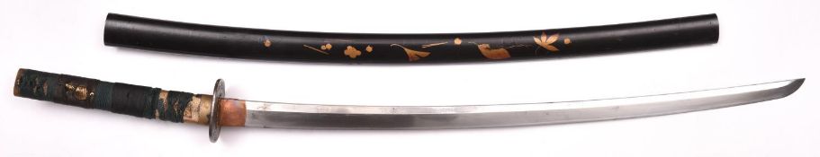 A Japanese katana with thin suguha hamon 68cms, details obscured, with black lacquer saya