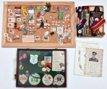 A quantity of WWI 'Flag Day' flags and collectors' badges, including a glazed mahogany display case,