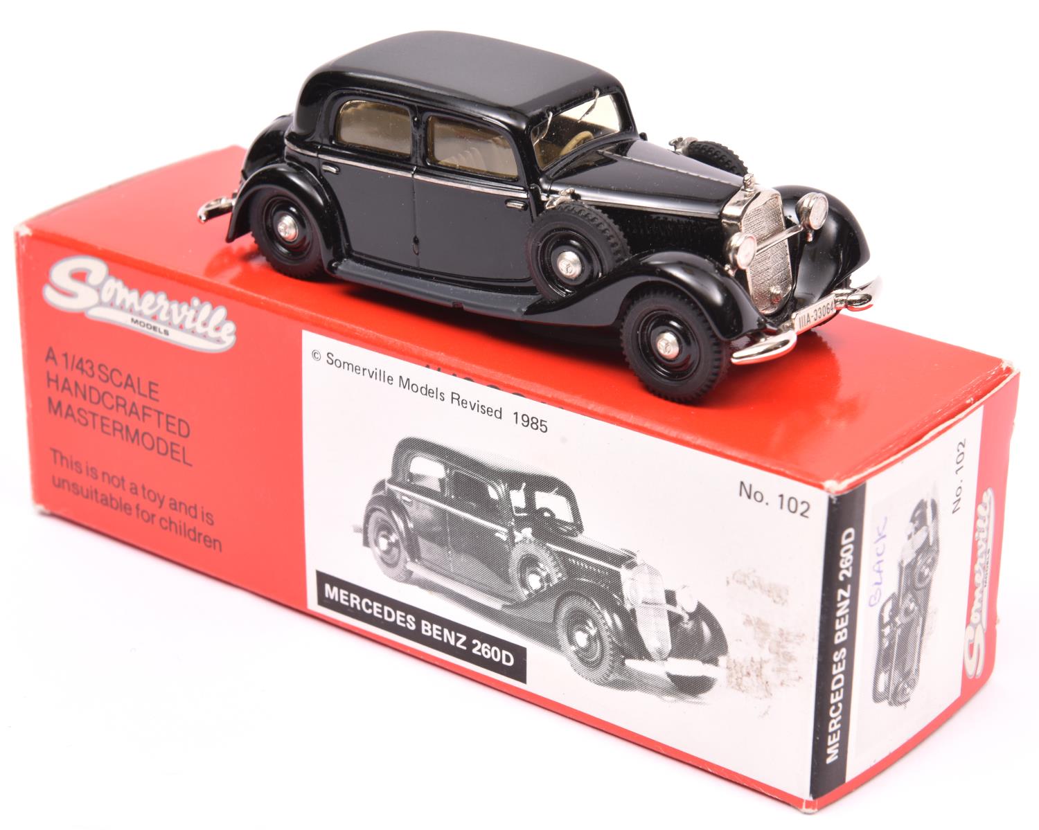 A Somerville Models Mercedes-Benz 260D. An example in black with tan interior. Boxed. Vehicle VGC,