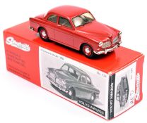 A Somerville white metal Volvo Amazon (No. 124). In red with beige interior and black dashboard,