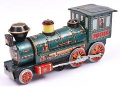A 1960's Japanese Modern Toys battery powered tinplate American style locomotive. 32cm overall
