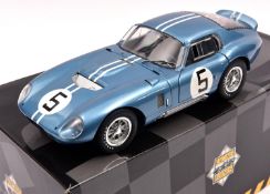 An Exoto Racing Legends 1:18 scale Cobra Daytona Coupe. In light metallic blue, RN5. Boxed, minor